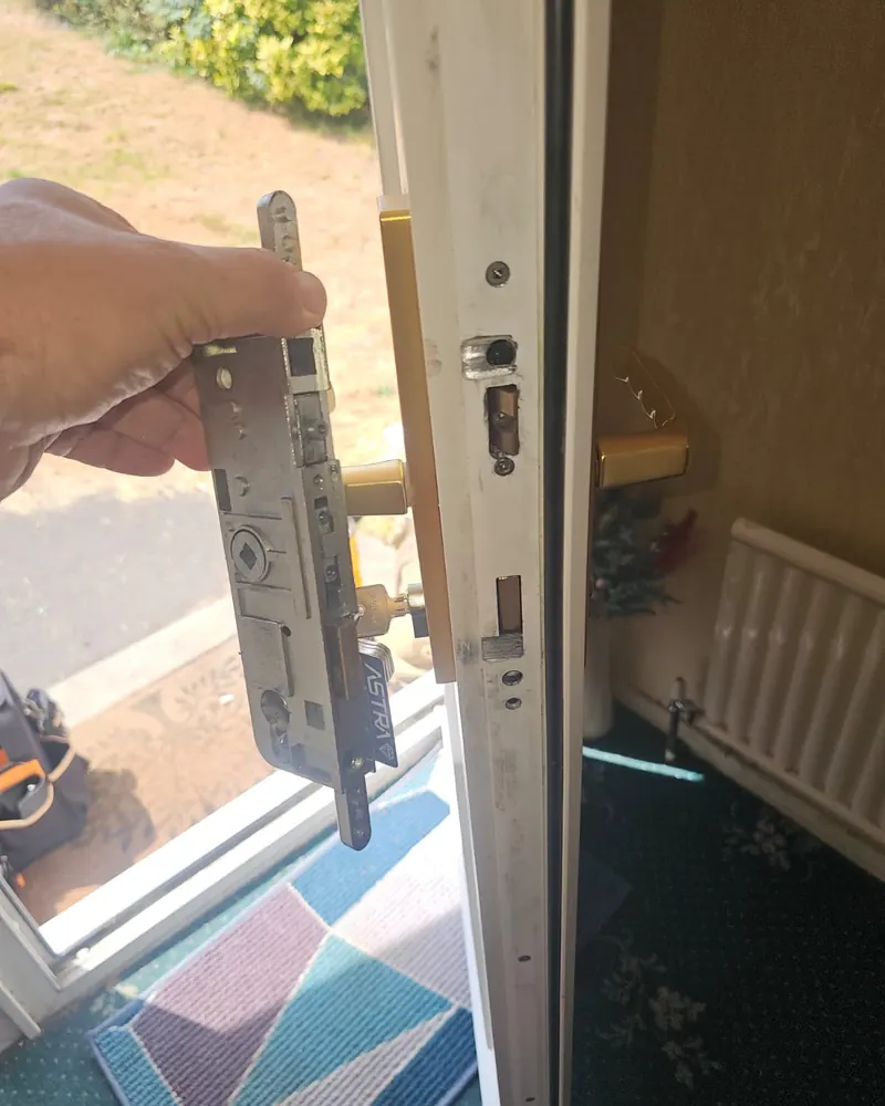 Multi-point door lock gearbox removed during a repair